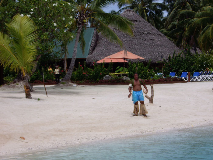 Welcome by a Cooks Islands style  warrior