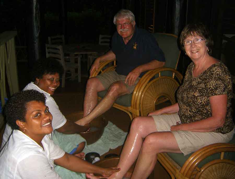 Rick and Chris enjoy a foot massage in Fiji.  Photo courtesy of Chris and Rick Millikan 