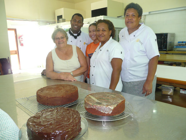 Flora, Seru, Kimali, Kelera & Vika with chocolate cakes.  Photo by Lenora Hayman