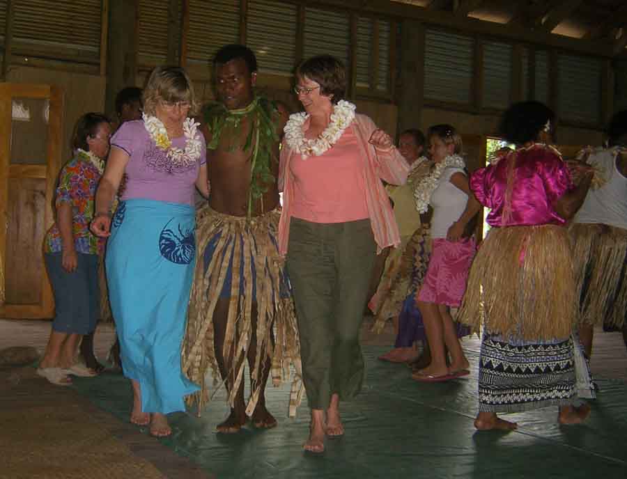 Learning the local dance in Fiji.  Photo by Rick Millikan