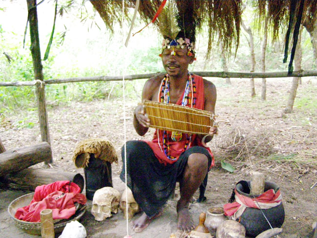 A witch doctor in the Ngomongo Villages, near Mombasa, Kenya Photo by Robert Scheer