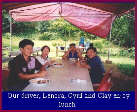 Our driver, Lenora, Cyril and Clay enjoy lunch after white water rafting in Malaysia's Sabah
