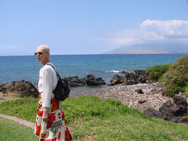 Cathy McDonald strolling towards beach. Photo by M. Maxine George