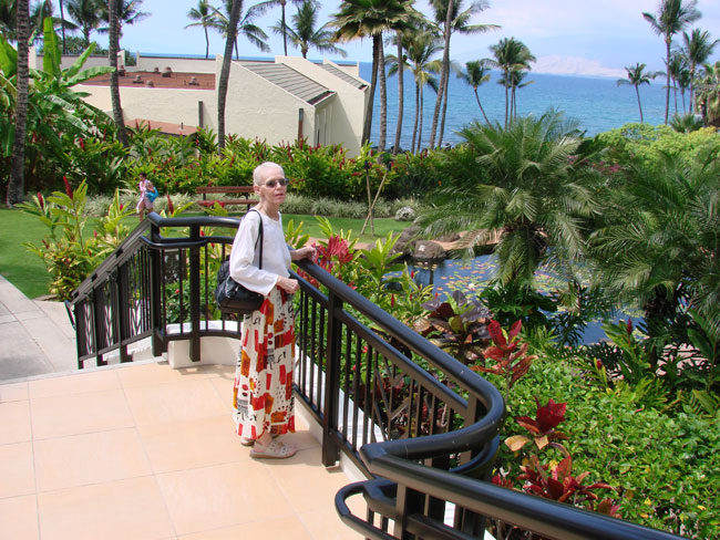 Cathy McDonald on steps at Wailea Beach Resort, Maui. Photo by M. Maxine George