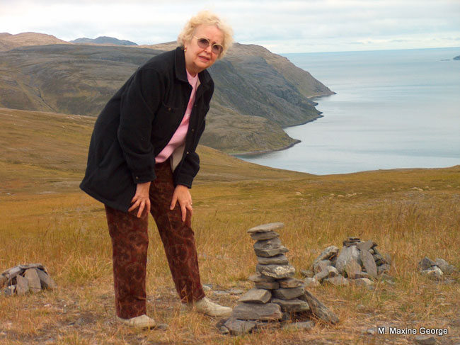 Maxine George inspects Inukshuk on Artic tour in Finmark on the island of Mageroya