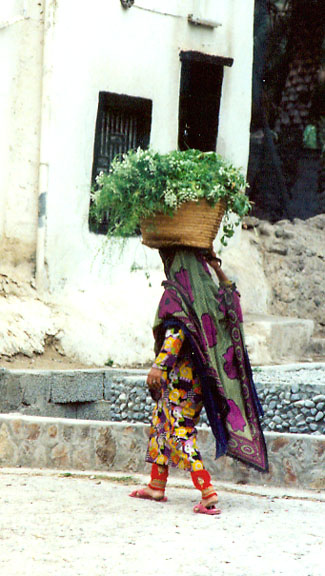 It is amazing what women can carry on their heads in Muscat Oman