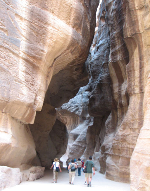 The soaring rock walls of Petra's  siq are deep and winding.  Photo by Margaret Deefholts