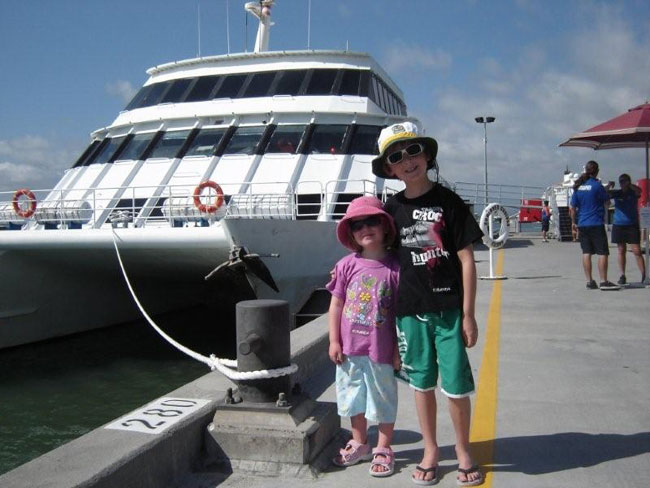 Sunlovers Reef Cruises catamaran with young adventurers in North Queensland.   Photo by Barry and Heather Minton.