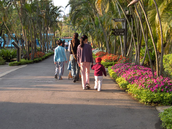 Visitors enjoy floral gardens surrounding home of the Chaing Kai Sheks.