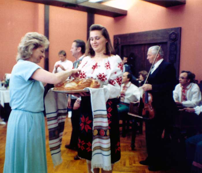 Myrna Archuk receives the traditonal welcoming ceremony with bread and salt.