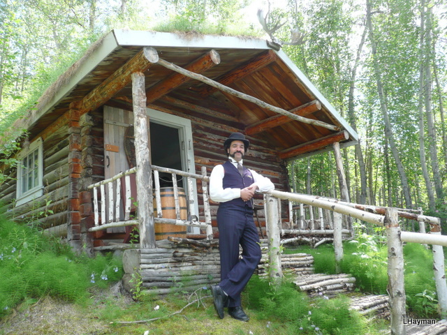 Fred Osson at Robert Service's Cabin in Dawson City, Yukon. Photo by Lenora Hayman