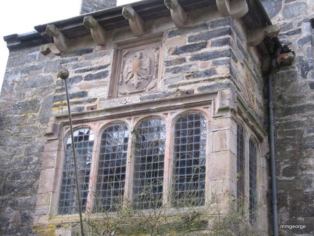 Ancient leaded windows and crest at Gwydir Castle, Wales.   Photo by M. Maxine George