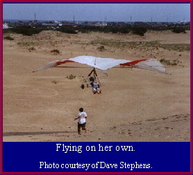 Flying on her own.