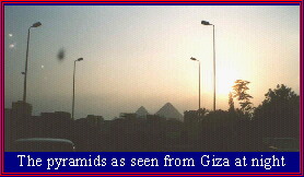 The pyramids as seen from Giza at night
