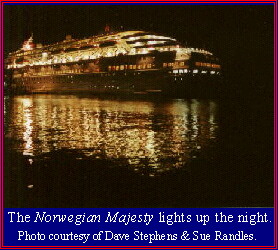The Norwegian Majesty lights up the night.