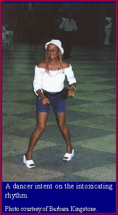 A dancer mesmerized by the beat of the music