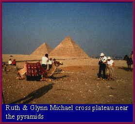 Ruth & Glynn Michael cross plateau near the pyramids.