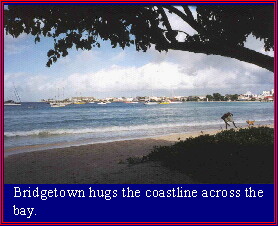 Bridgetown hugs the coastline across the bay.