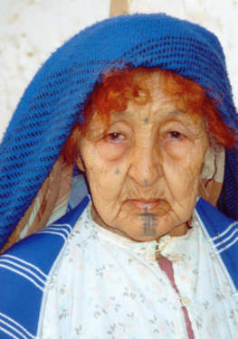 The lady with the tattooed face