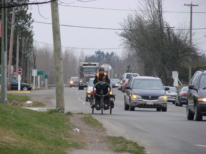 Unusual cavelcade approaches on Fraser Highway, Aldergrove, B.C.